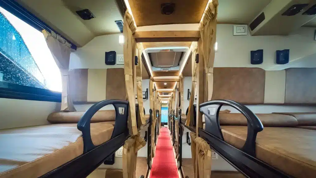 Faisal Movers sleeper bus cabin with proper flat beds and privacy curtains